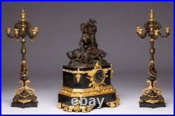 Antique Large Signed French gilt and patinated bronze clock and garniture set
